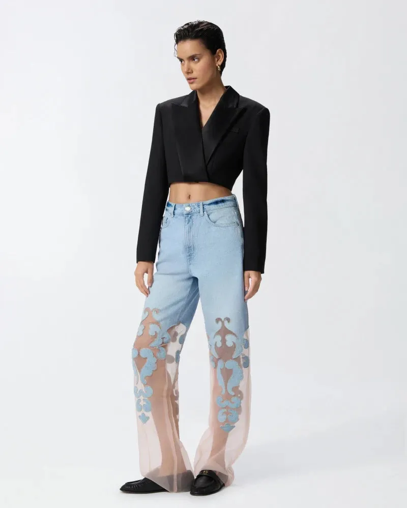 Denim jeans with applique and organza